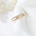 Macro detail of gold plated geometric double ring connector with sliding zircon stones - Rectangular Slide Style (H-10070)