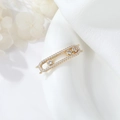 Detail of gold-plated pendant connector with micro-pave cubic zirconia and sliding rings - Long Three Diamond Slide (H-10069)