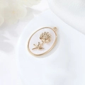 Ciondolo ovale placcato oro 14K con madreperla bianca e charm girasole in 3D - Novembre