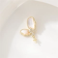 Close-up of 14K gold plated butterfly pendant with white shell inlay and zircon accents - Butterfly Style (H-9510)