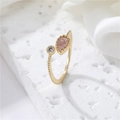 Detail of adjustable gold ring with pear-cut pink stone and millgrain texture band - 14K Gold Pink Stone Style(H-10128)