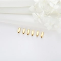 Polished gold-plated copper tube beads for DIY bracelet jewelry making on white fabric - Flat Oval Tube Style (Y-0145)
