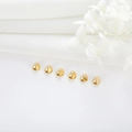 Set of shiny gold plated faceted beads for DIY jewelry making on white background - Geometric Polyhedron Style (Y-0246)