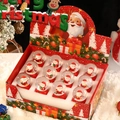 Pack of 12 mini Santa Claus snow globes with red bases in a festive display box - Christmas Style (Mixed) / 45# Christmas Hat (Box of 12)