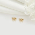 Detail showing 14k gold-plated bow charm with sparkling white zircons for DIY jewelry - Micro-inlaid Bow Knot Style (H-7174)
