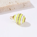Close-up of a 14k gold-plated egg pendant with yellow enamel and micro-set cubic zirconia - Yellow Plaid