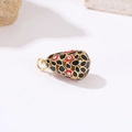 Macro detail of teardrop evil eye pendant in gold brass with red and black enamel - Black (H-9449 Black)