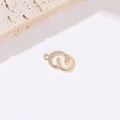 Macro shot of 14k gold interlocking double ring pendant with pavé cubic zirconia - Double Interlocking Rings Pendant (N-0416)