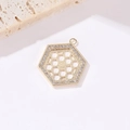 Macro shot of a 14k gold plated hexagonal honeycomb pendant with sparkling zircon accents - Hexagon Honeycomb Pendant (W-0006)