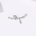 Macro shot of silver fluid metal heart charm with clear zircon for DIY jewelry making - Branch Heart Style (H-9305) / Palladium