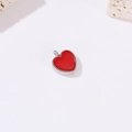 Macro shot of red enamel heart pendant with silver beaded edge on a textured stone - Red Heart Style (H-9292 Red) / Silver