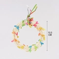 Dettaglio dell'altalena in rattan da 15,5 cm per uccelli con foglie di carta colorate - Piccolo Stile in Rattan Intrecciato Colorato