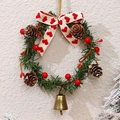 Ghirlanda di Natale con pigne bacche rosse e fiocco per decorazione festiva di porte e muri - Ghirlanda di Natale da Appendere