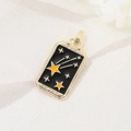 Macro detail of gold-plated The Star tarot pendant with black enamel finish - Star Tarot Style (H-6945)