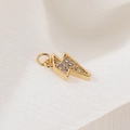 Gold plated lightning bolt pendant with sparkling zircons on white soft tulle fabric - Lightning Bolt Style (H-7148)