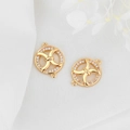 Close-up of golden zircon-encrusted round connectors for DIY jewelry making - Round Hollow Style (H-6732)