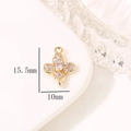 Dettaglio del ciondolo a fiocco di neve in oro 15,5x10mm con zirconi micro-pavé - Forma di Stella a Croce (H-7287)