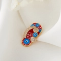 Close-up of golden flip-flop charm with red enamel and blue Evil Eye patterns - Flip Flop Style H-6485 / Red