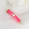 Pink enamel cylinder evil eye charm bead with golden plating and zircon accents - Pink