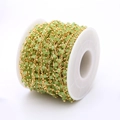3mm green faceted crystal beads with golden metal chain on a white spool roll - Green