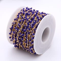 Catena di perle in cristallo blu scuro 3mm con filo dorato su bobina di plastica - Blu