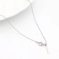 Macro detail of 14k gold-filled adjustable needle chain necklace with stopper bead - Palladium Color H-2052 Necklace