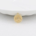 Macro detail of gold coin pendant with sunburst evil eye pattern and zircon stones - 14K Gold / H-3758 White Zircon