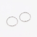 Detailed view of silver rings with hammer texture and geometric faceted metal surface - 16mm / Palladium
