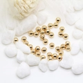 Macro shot of 14K gold plated spring ear hooks with spherical beads for DIY jewelry making - 4mm (ai-100 Pieces/Pack) / 14K Gold