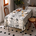 Bohemian linen tablecloth with black floral print and decorative ball tassel edges - 150cm Round / Black Floral with Tassels