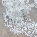 White lace table runner with daisy embroidery and mesh details on a wooden surface - 35cm*160cm / White (Floral)