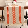 Bohemian style table runner with orange geometric patterns and tassel details - 30x220cm / Orange Geometric