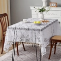 White floral lace tablecloth with fringe edges in a cozy rustic interior setting - White Peony / 140*100