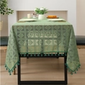 Détail d'une nappe tissée creuse verte avec motifs en losanges et franges élégantes - XS / Vert