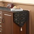 Runner da tavola nero moderno con motivi geometrici dorati e nappa bianca fatta a mano - Stile Corto / Nero Stampato in Oro
