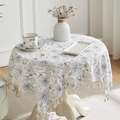 Round cotton linen tablecloth with blue floral print and elegant fringe trim - White Floral Pattern