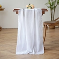 Elegant white chiffon table runner draped over a wooden table for wedding decor - 70*300 / Pure White