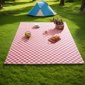 Classic red and white checkered picnic mat spread on a lush green lawn near a tent - Standard Size / Pink & White Plaid