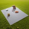 Classic black and white checkered picnic mat spread on green grass for outdoor leisure - Standard Size / Grey and White Plaid