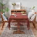Rectangle vintage wine red lace tablecloth with hollow floral pattern on a wood table - Brick Red