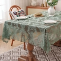 Pale green vintage lace tablecloth with elegant floral patterns on a wooden table - 140*100cm / Green