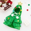 Detail of green Christmas tree pet cape with pom-poms and gold star atop a plush fabric - Christmas Tree Cape / S / Green