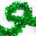 Detail of emerald green tinsel garland with shiny circular sequins for festive decoration - Plain Style / Green