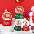 Close-up of Merry Christmas snow globes with bear figurines and festive red bases - Style 65 Orange Floral / Style E