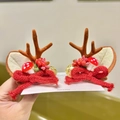 Close-up of Christmas reindeer antler hair clips with knit bows and berry details - Knitted Bow Antler Clips (Brown)