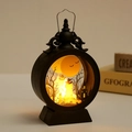 Halloween vintage LED lantern with pumpkin and castle silhouette in warm yellow light - Pumpkin