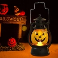 Lanterna retrò di Halloween con luce LED a forma di zucca e finitura nera opaca - Faccia Buffa