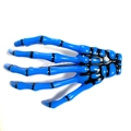 Vibrant blue skeleton hand hair clip with black joints for Halloween parties - Blue