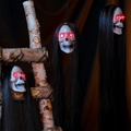 Three-piece glowing skull set with long black hair and red LED eyes for Halloween decor - Long Hair Horror Glowing Skull 3pcs Set