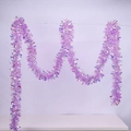 Detail of 10m purple pink tinsel garland with laser holographic effect for festive parties - Iridescent Tinsel / 2m / Light Purple
